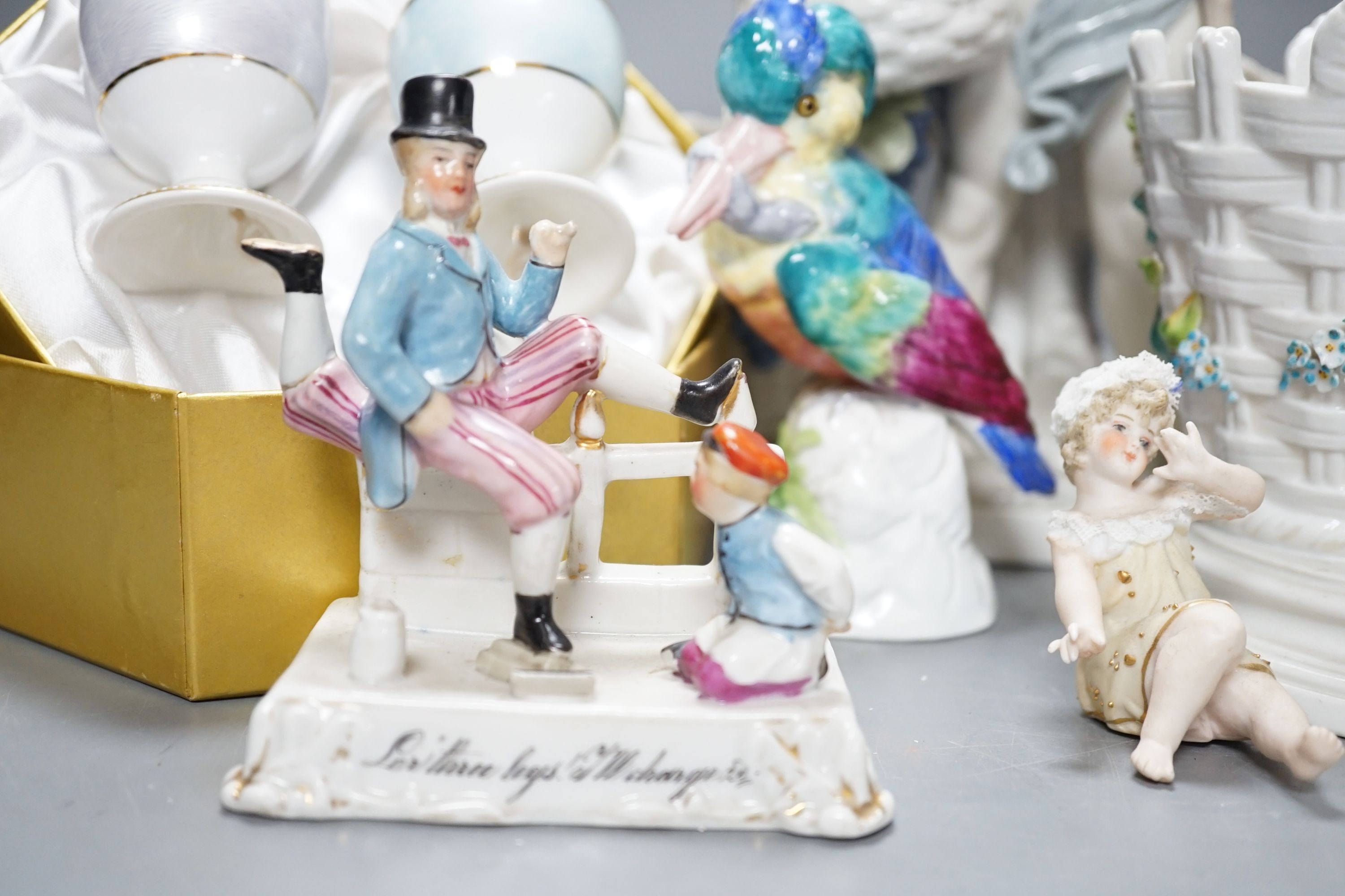 Ornamental china including uncommon three legged fairing, fairing 11 cms high, two continental porcelain groups, a Worcester figure the parakeet etc.
